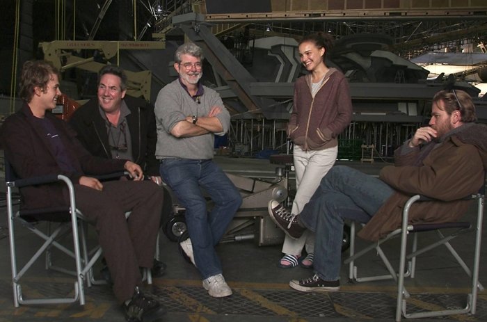 (Left to right) Hayden Christensen, Producer Rick McCallum, Writer-Director George Lucas, Natalie Portman, and Ewan Gordon McGregor OBE gather on the first day of shooting of Star Wars: Episode III Revenge of the Sith