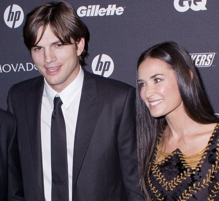 Ashton Kutcher is approximately 9 inches taller than Demi Moore, with a height of 6 feet 2.5 inches (189.2 cm), while Demi Moore stands at 5 feet 4.5 inches (163.8 cm)