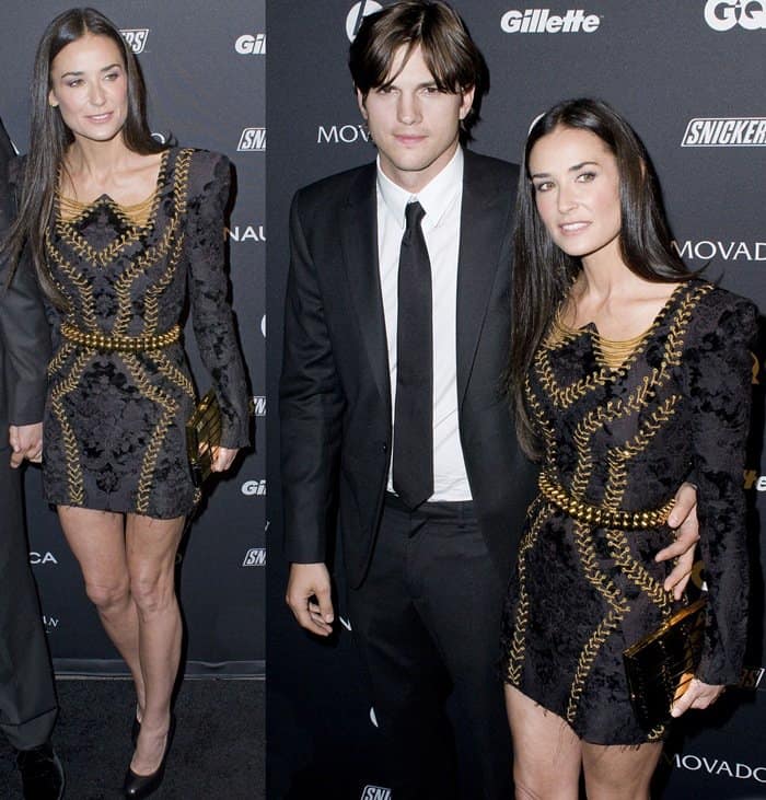 Demi Moore and Ashton Kutcher pose on the black carpet at GQ's 'The Gentlemen's Ball' held at the Edison Ballroom in New York City on October 27, 2010