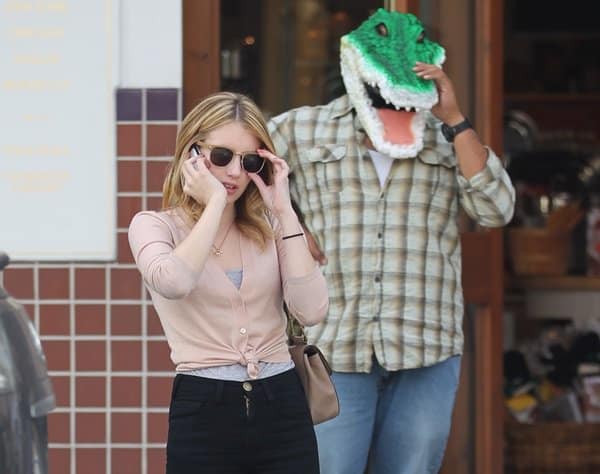 Emma Roberts chatting on the phone and running some errands in Beverly Hills on October 29, 2010