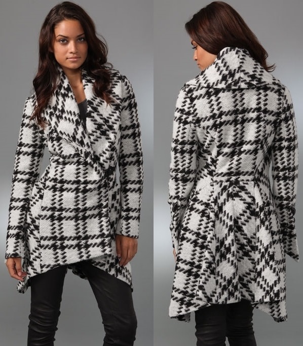 This plaid coat features a shawl collar and a leather hook-and-eye closure