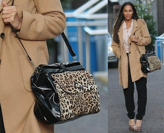 Leona Lewis makes a stylish exit from ITV Studios in London, England, on December 9, 2011, accessorizing her look with a chic leopard print bag, further cementing the enduring appeal of this pattern