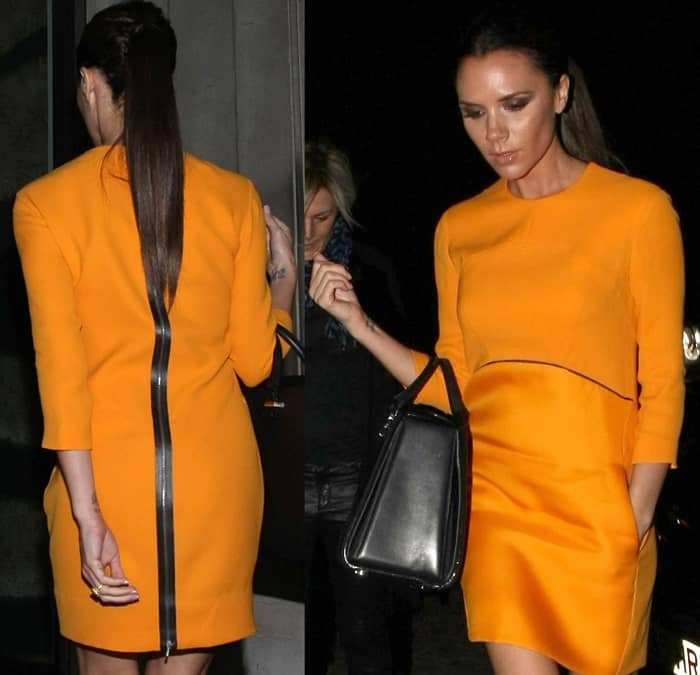Victoria Beckham rocks a tangerine orange dress from her fashion line arriving at Gordon Ramsay's Maze restaurant