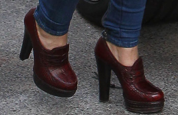 Cheryl Cole shows off the detail on her Prada loafer pumps