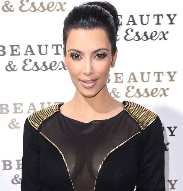 Kim Kardashian's sexy sheer black dress with gold embellishments