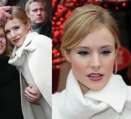 Kristen Bell elegantly draped in a Vanessa Bruno knit cape, showcasing timeless style