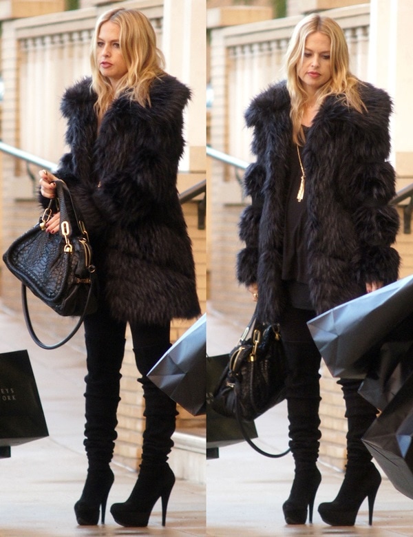 Rachel Zoe wears a fur coat with thigh-high stiletto boots while out shopping in Beverly Hills
