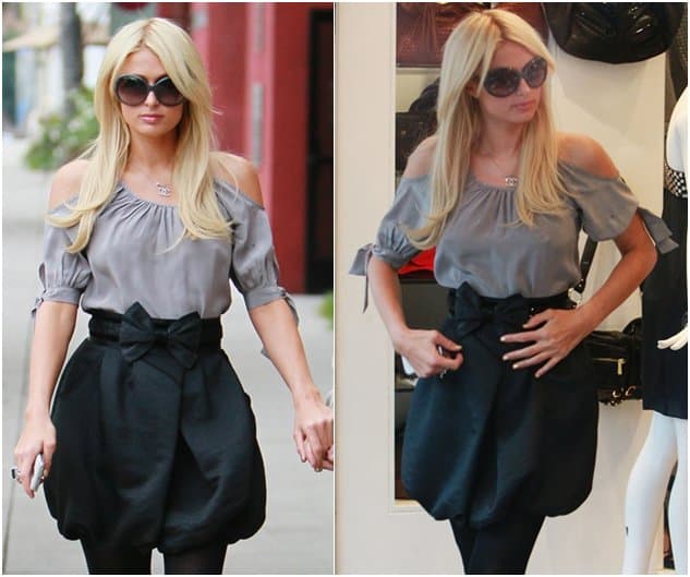Paris Hilton paired an off-shoulder grey top with a bow belted bubble skirt