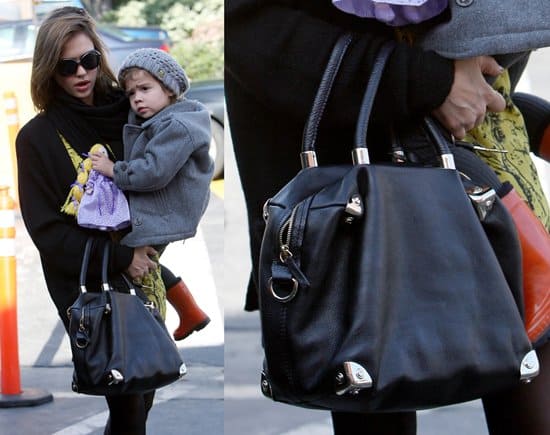 Jessica Alba and her daughter Honor, showcasing her timeless Viktor & Rolf handbag, on a festive shopping spree at Trader Joe's, West Hollywood - Christmas Eve, 2011