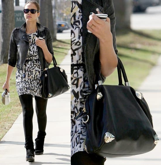 Jessica Alba, effortlessly chic, matches her workday outfit with her favorite Viktor & Rolf handbag while heading to her Santa Monica office, January 20, 2011