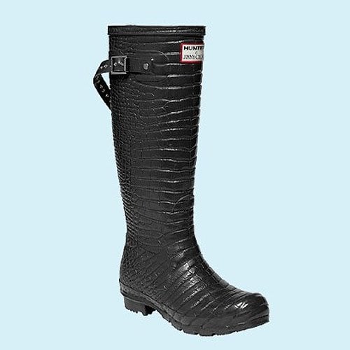 A sleek and rugged Jimmy Choo x Hunter crocodile-embossed rain boot, combining high-fashion luxury with all-weather durability