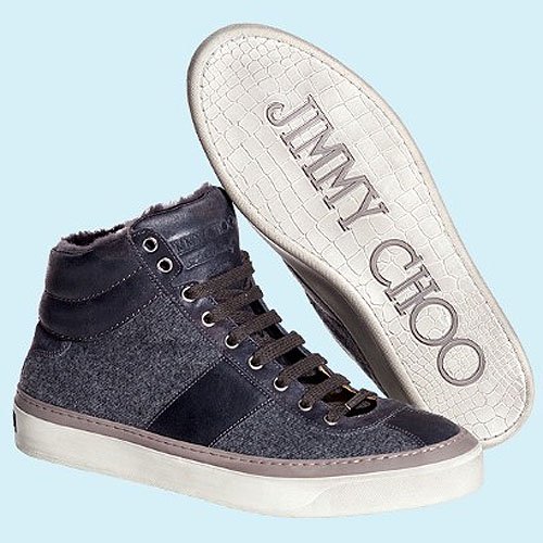 A stylish Jimmy Choo high-top sneaker featuring a luxe mix of suede and wool, finished with a signature crocodile-embossed sole for a refined urban edge