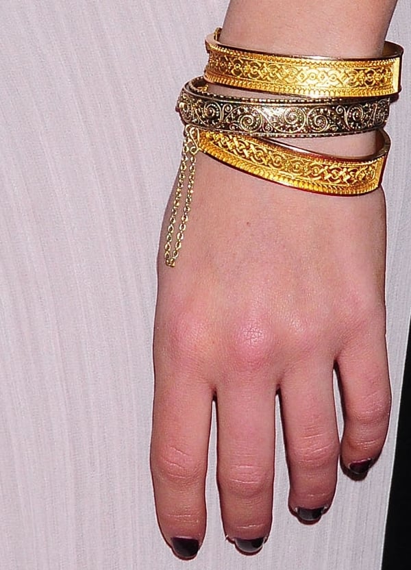 Mila Kunis shows off her 19th-century gold bangle bracelets