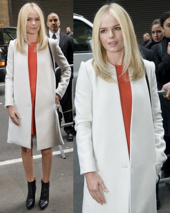 Kate Bosworth styled an orange shift dress with a coat and a Derek Lam black shoulder bag