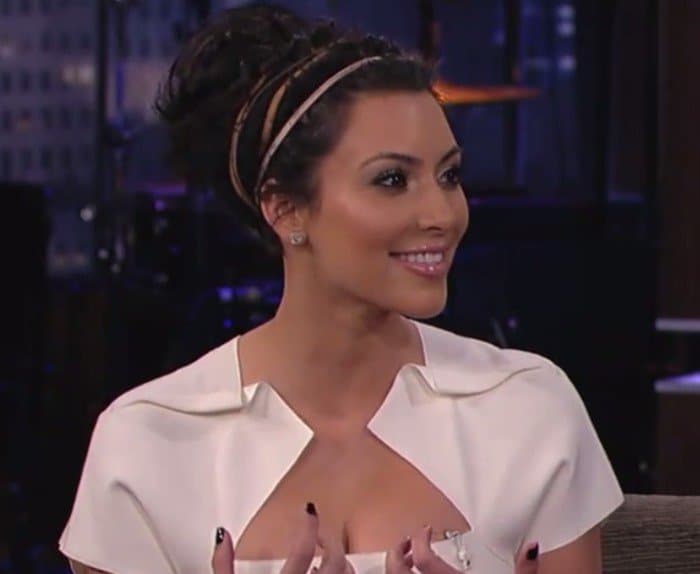 Kim Kardashian exudes sophistication on ABC's 'Jimmy Kimmel Live,' showcasing the elegance of Roland Mouret's 'Myrtha' dress, February 3, 2011