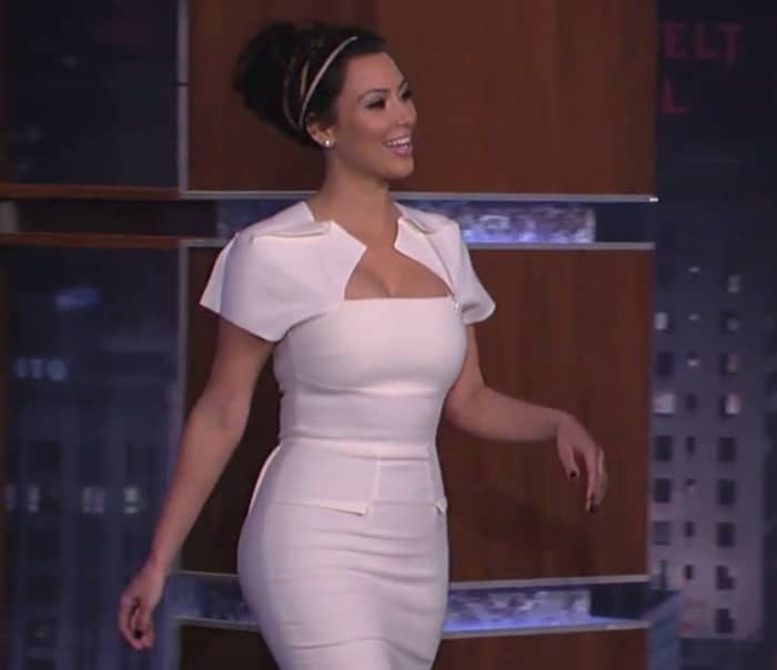 Kim Kardashian embodies elegance in Roland Mouret's 'Myrtha' sheath dress, a testament to the designer's ability to flatter diverse figures, captured on February 3, 2011