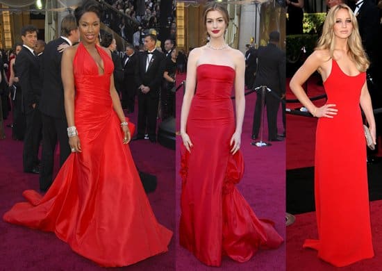 Jennifer Hudson in an Atelier Versace Spring 2008 bright red gown; Anne Hathaway in a Valentino Couture Fall 2002 gathered red gown; Jennifer Lawrence in a Calvin Klein fire engine red dress