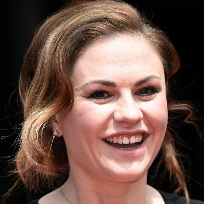 Anna Paquin has promised not to fix the teeth she showed off at the premiere of The Parting Glass