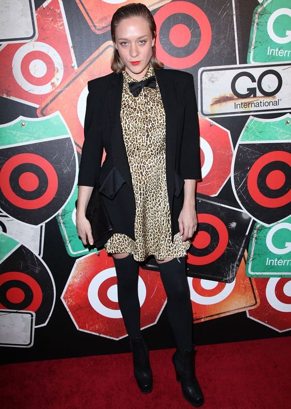 Chloë Sevigny rocks black over-the-knee stockings at the GO International Designer Collective Launch