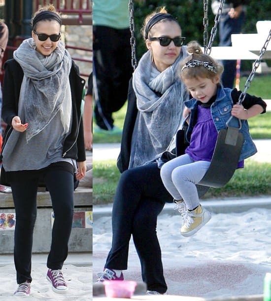 Elegant and Effortless: Jessica Alba pairs a chic, patterned scarf with casual attire during a sunny day at the park in Beverly Hills, showcasing her flair for accessorizing