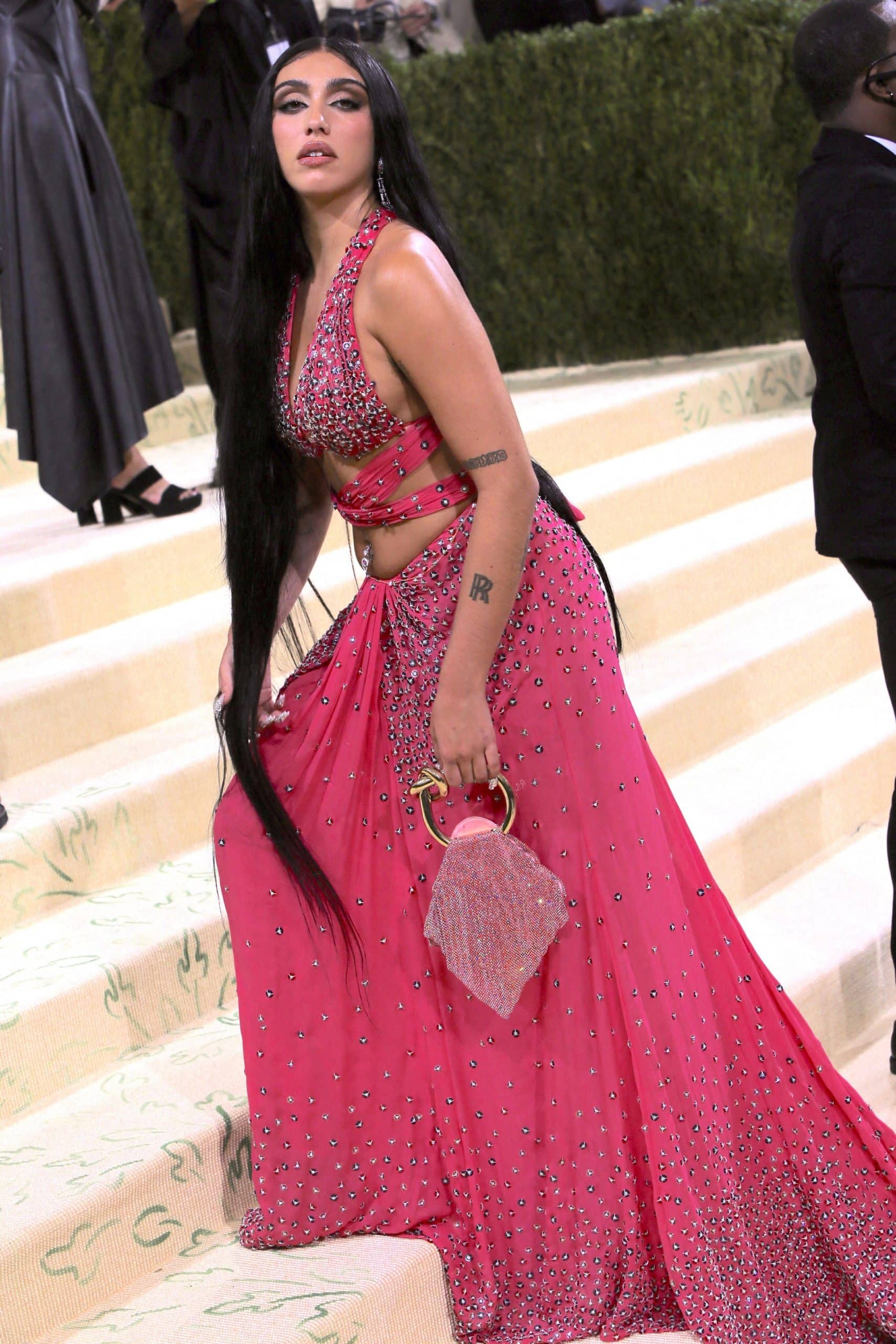 Lourdes Leon decided not to shave her armpits when attending the 2021 Met Gala with a belly button piercing and long hair extensions