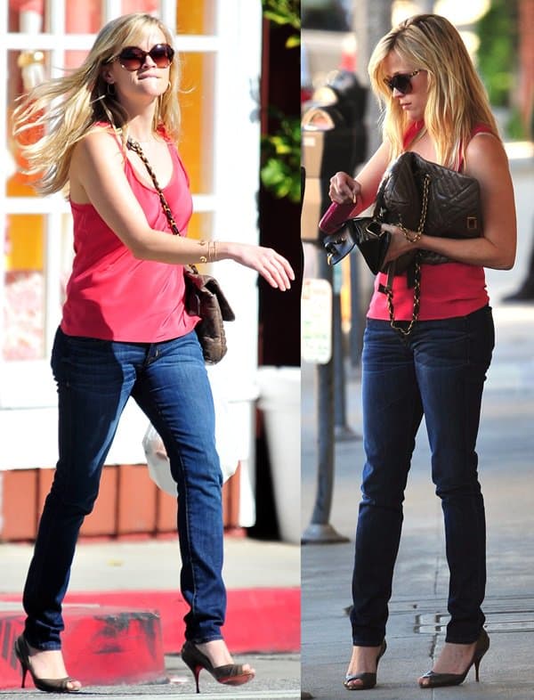 Reese Witherspoon stuns in a breezy pink tank top paired with dark Hudson Beth Baby boot-cut jeans and chic open-toe stiletto heels