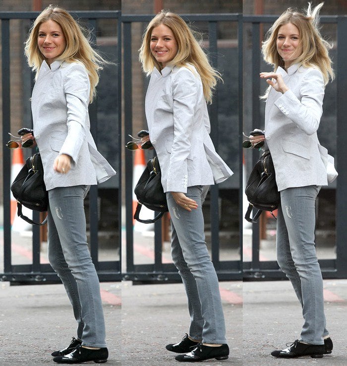 Sienna Miller wears light skinny jeans with black oxford shoes
