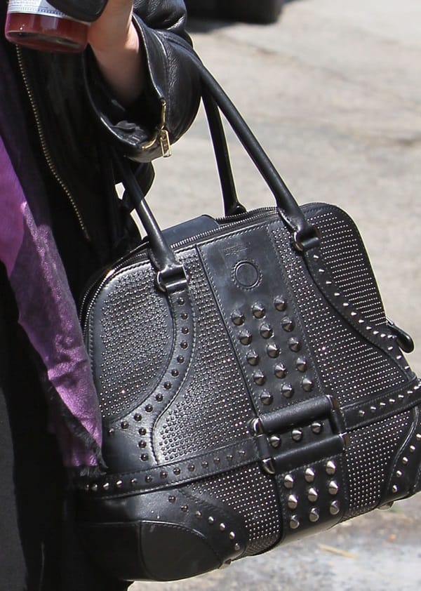 A detailed look at Anna Paquin’s studded Alexander McQueen Novak handbag, a bold and edgy take on the iconic design