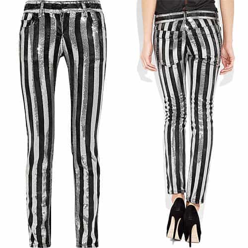 Balmain's faded-black rigid-denim jeans are embellished with silver sequined stripes