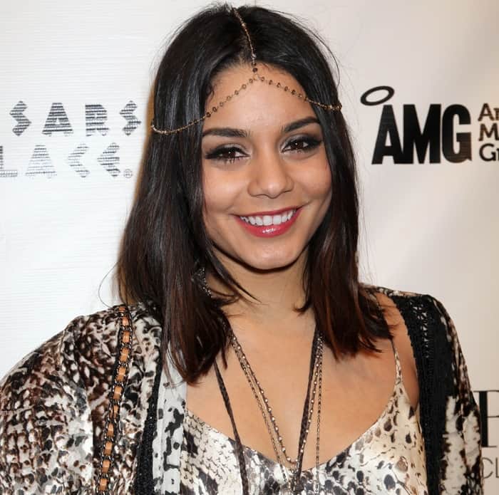 Vanessa Hudgens showcases her unique style in Blu Moon's 'Summer Lovin’' dress and 'Goddess' jacket, both in snake print, at a 'Sucker Punch' event in Vegas