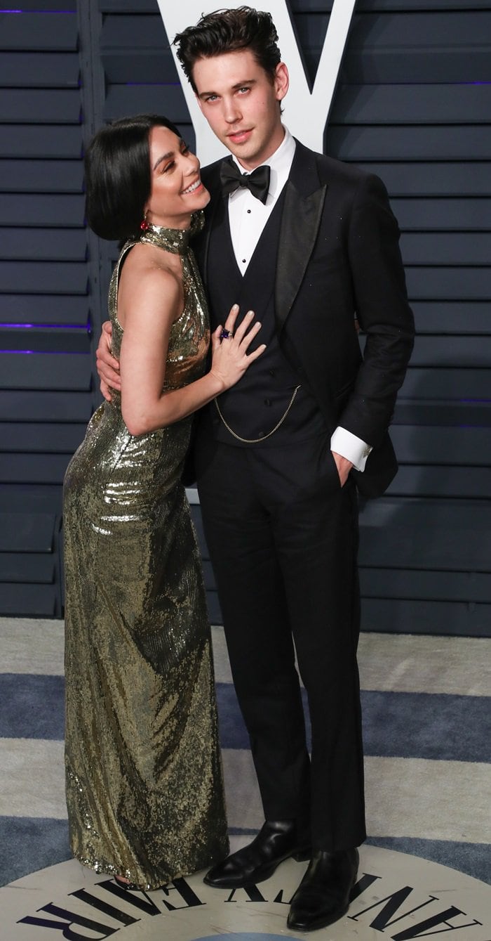 Vanessa Hudgens dazzles in a gold sequined gown alongside then-boyfriend Austin Butler at the Vanity Fair Oscar Party