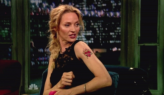 Uma Thurman in a black Dolce & Gabbana dress