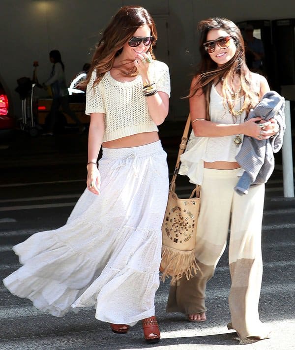 Ashley Tisdale and Vanessa Hudgens arrive at LAX from a holiday at Cabos San Luca in Mexico
