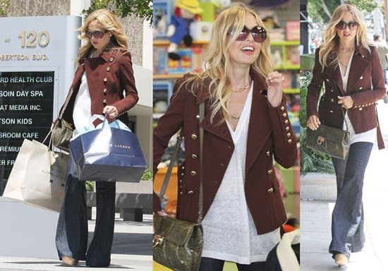 Rachel Zoe, renowned for her chic style, spotted on a shopping spree along Robertson Boulevard in Beverly Hills on May 19, 2011, sporting her favorite J Brand maternity jeans