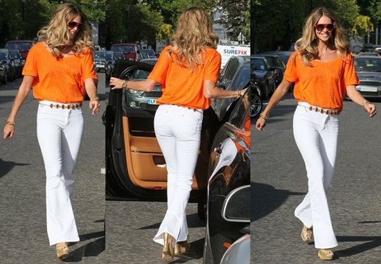 Captured on May 3, 2011, Elle MacPherson gracefully balances motherhood and style during a school run in London