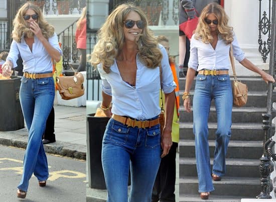 Elle MacPherson radiates early-morning elegance in London on a school run, April 27, 2011