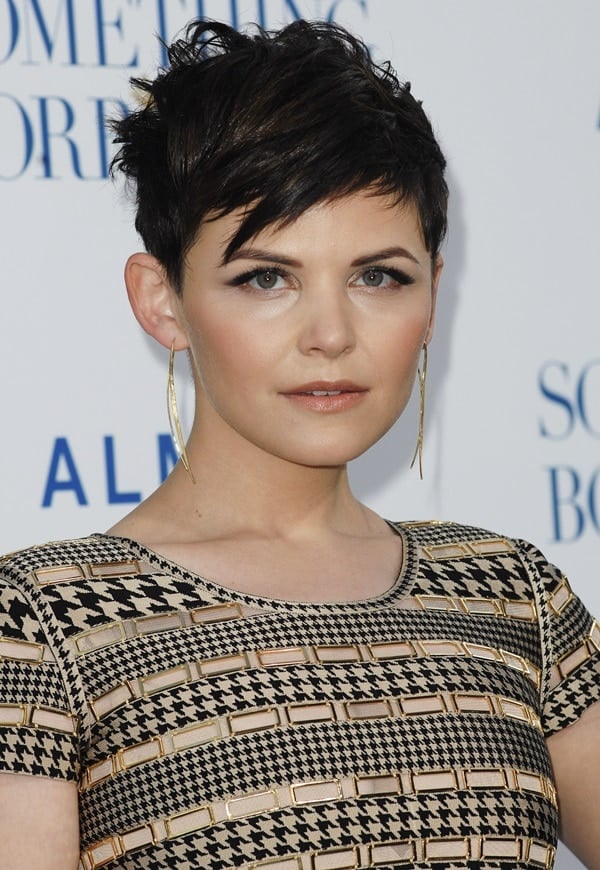 Ginnifer Goodwin shows off her gold dress and her spiked black hair at a movie premiere