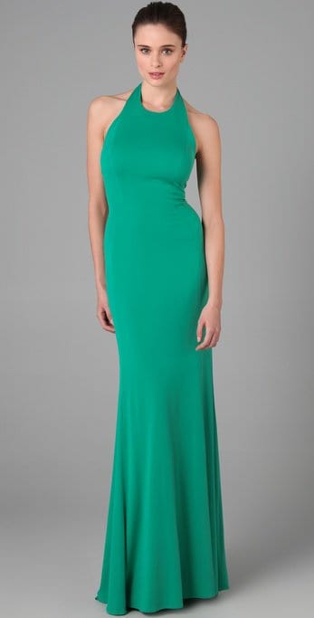 This green silk-jersey halter maxi dress features a crew neck and an open back