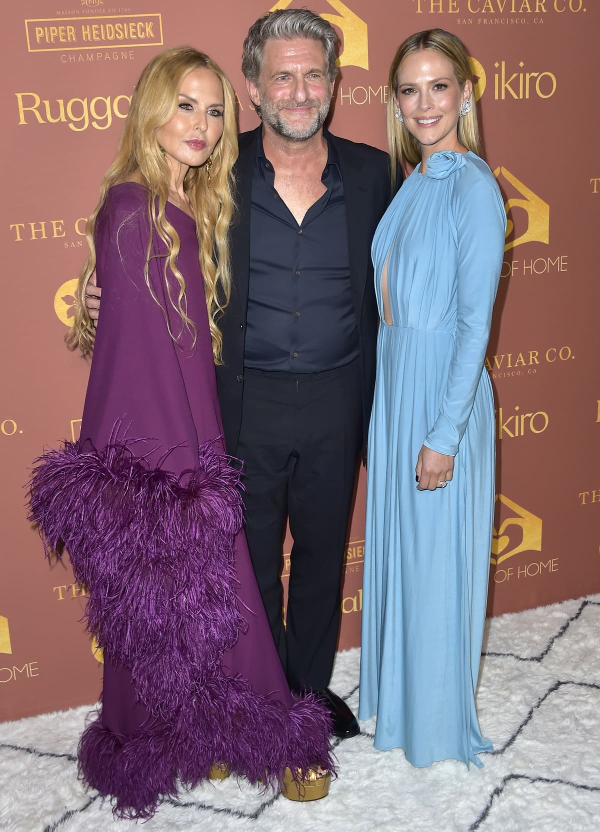 At the A Sense of Home Gala 2023 held at a Private Residence on October 21, 2023, in Los Angeles, California, the 5'8" (1.73 m) tall Rachel Zoe appeared surprisingly shorter while posing alongside Gary Gilbert and Charlotte Gilbert