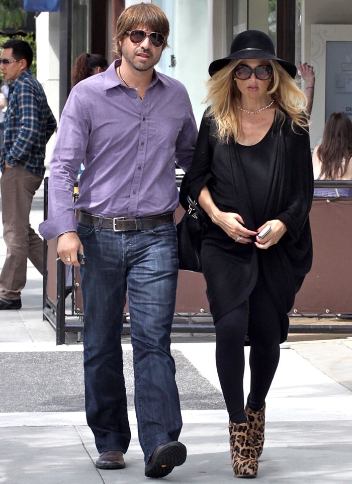 At 38 weeks pregnant, fashion icon Rachel Zoe stylishly steps out for lunch with her husband Rodger Berman, showcasing her grace and elegance at Jack and Jill's restaurant in Los Angeles, California, March 14, 2011