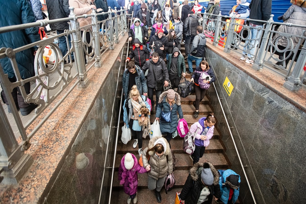 Ukrainian refugees from Mariupol on Lviv railway station waiting for a train to escape to Europe