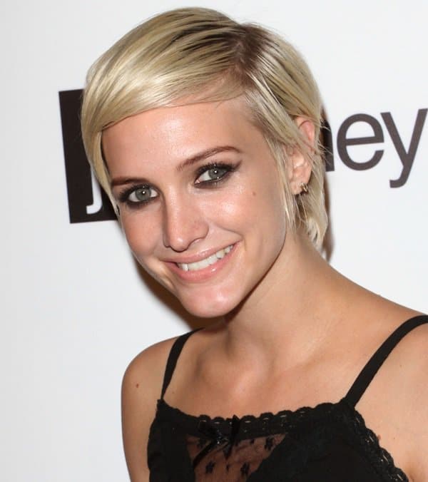 Ashlee Simpson with short blonde hair arrives at JC Penny celebrating Charlotte Ronson's "I Heart Ronson" summer sportswear collection