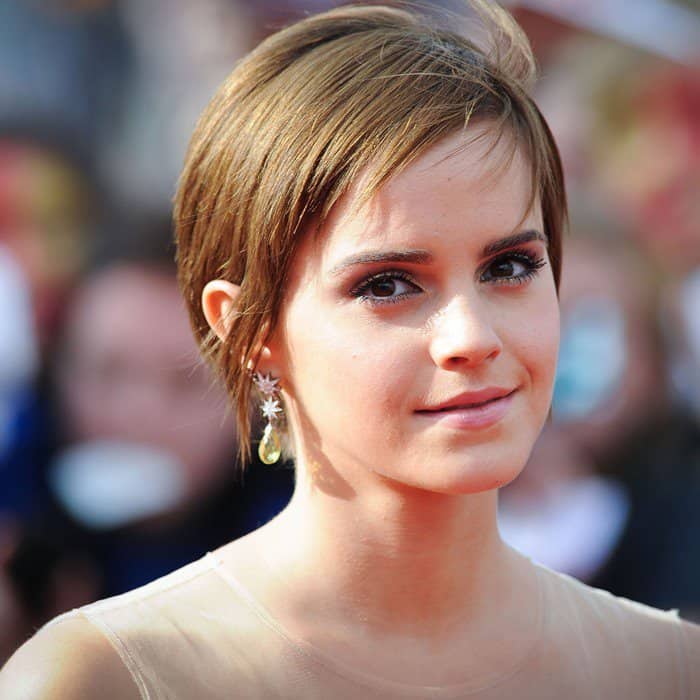 Emma Watson's eyes are a stunning shade of hazel, flecked with green and gold that shift depending on the light