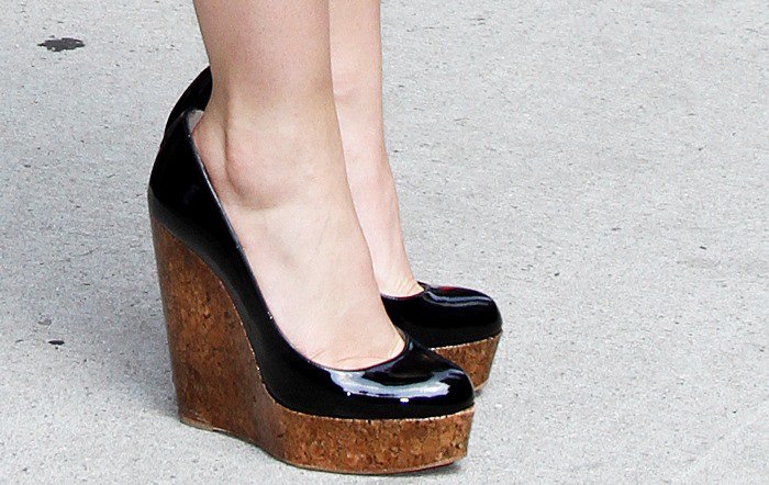Emma Watson's feet in cork-heeled wedge Christian Louboutin shoes