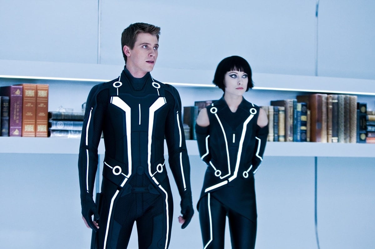 Garrett Hedlund as Samuel "Sam" Flynn and Olivia Wilde as Quorra in the 2010 American science fiction action film Tron: Legacy