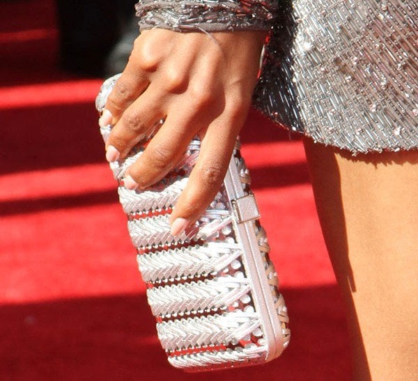 Kerry Washington carries a silver hard-case clutch on the ESPY Awards red carpet