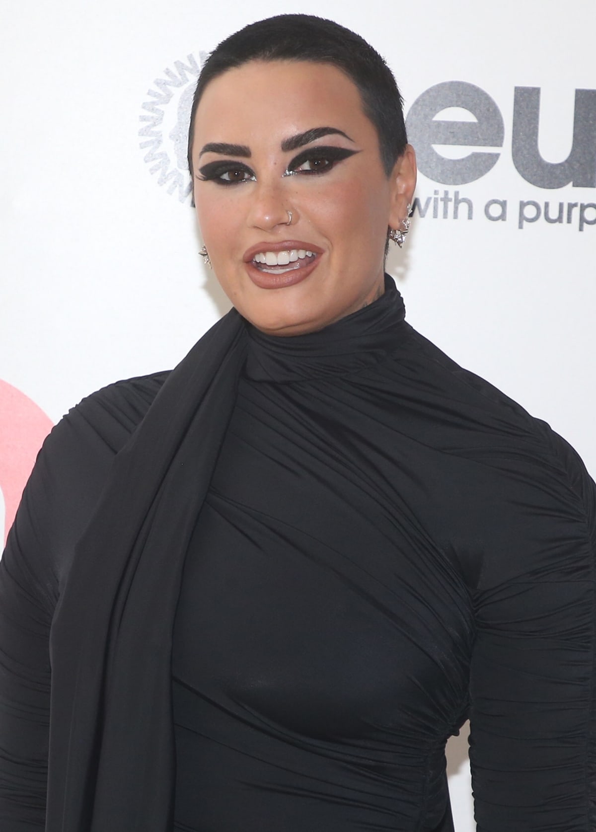 Demi Lovato shows off her Maria Tash Javanese spike earrings