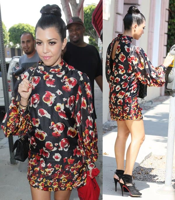 Kourtney Kardashian flaunts her legs in an Aryn K Fire Blossom mini dress while exiting Vera Wang