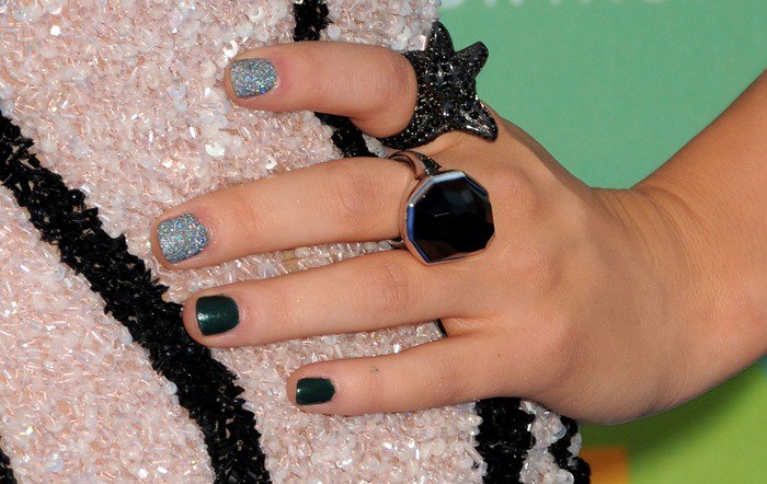 Lucy Hale accessorizes with glittery nail polish and black-and-silver statement rings