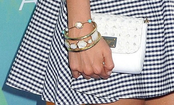 Exquisite Accessory: Nina Dobrev elegantly carries a quilted white D&G clutch, a standout piece in her Teen Choice Awards outfit